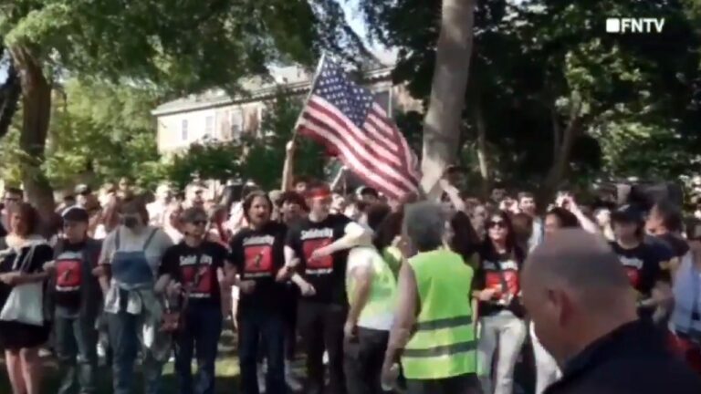 Patriotic Students Protest Behind Anti Israel Protesters.jpg